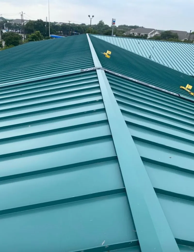 Green commercial metal roof ridge and valley for Metal Roof Repair in Wolcott